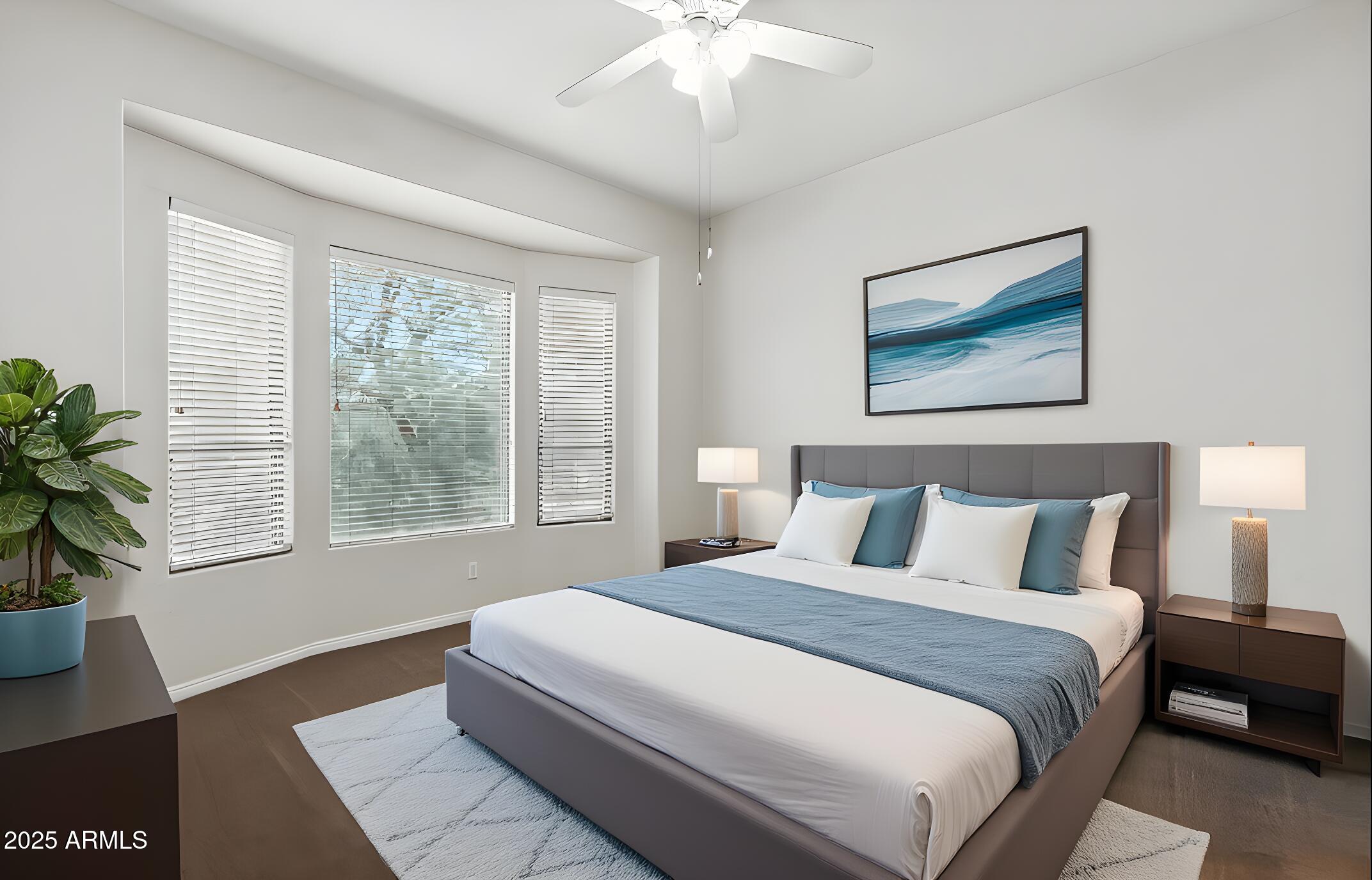 16420 North Thompson Peak Parkway, Unit 2031 Scottsdale, AZ 85260 - Photo 21 of 30 a bedroom with a large bed and a window