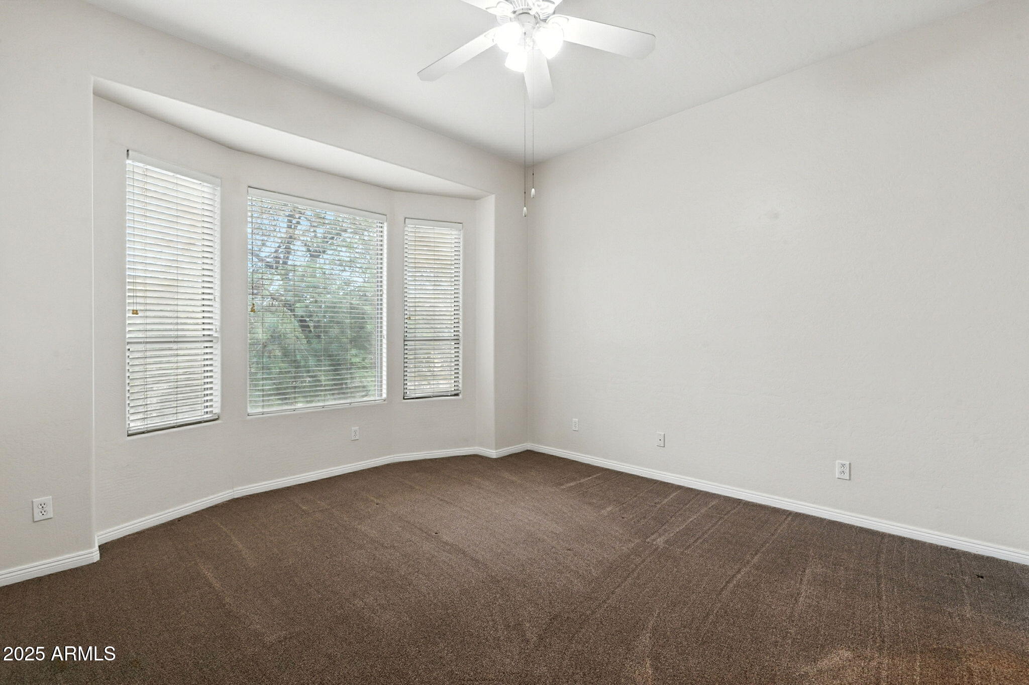 16420 North Thompson Peak Parkway, Unit 2031 Scottsdale, AZ 85260 - Photo 22 of 30 an empty room with a window