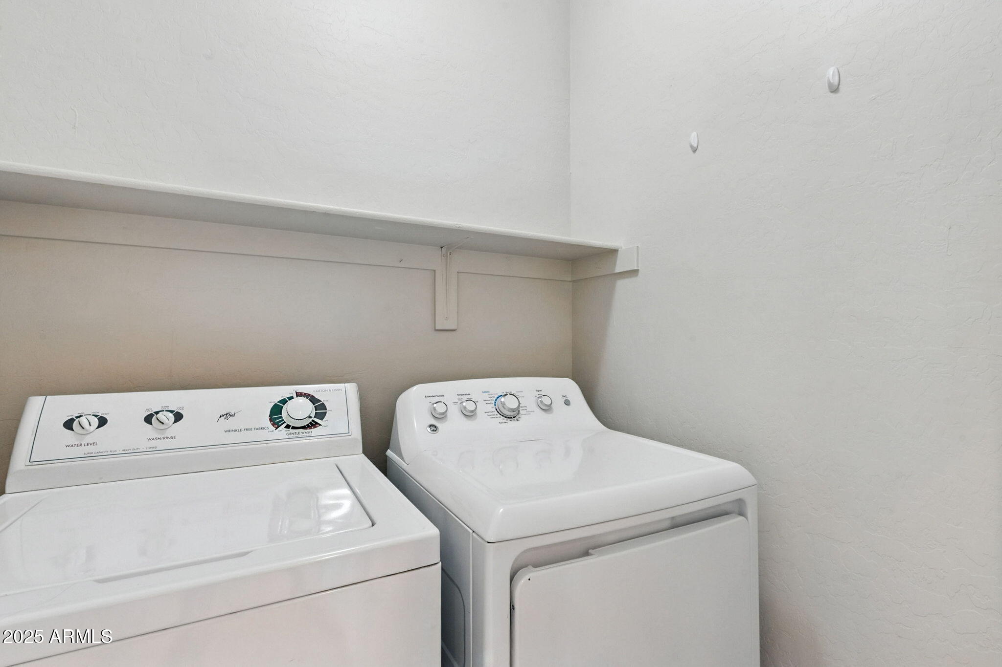 16420 North Thompson Peak Parkway, Unit 2031 Scottsdale, AZ 85260 - Photo 28 of 30 a utility room with dryer and washer