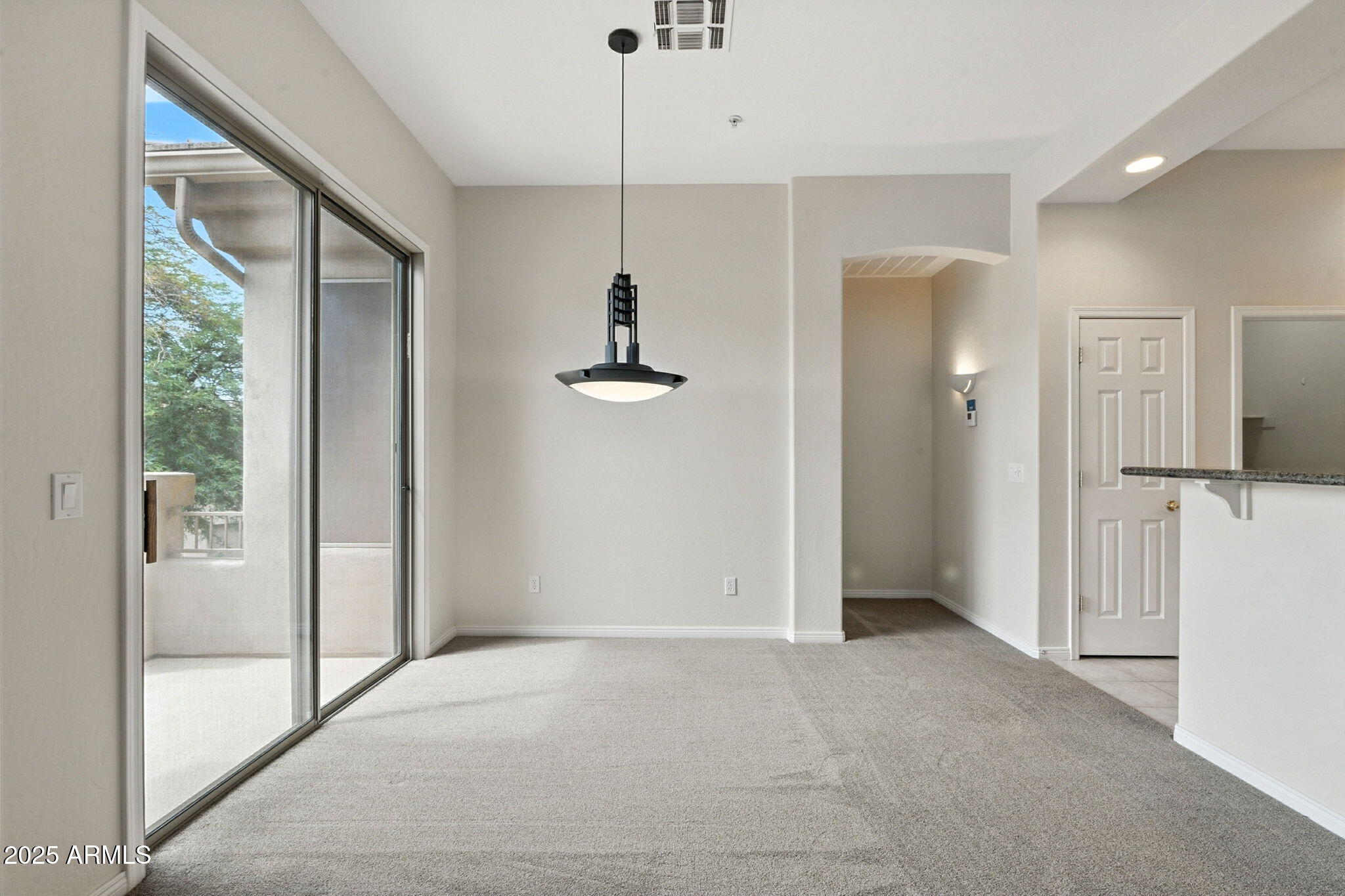 16420 North Thompson Peak Parkway, Unit 2031 Scottsdale, AZ 85260 - Photo 9 of 30 a view of empty room with a ceiling fan