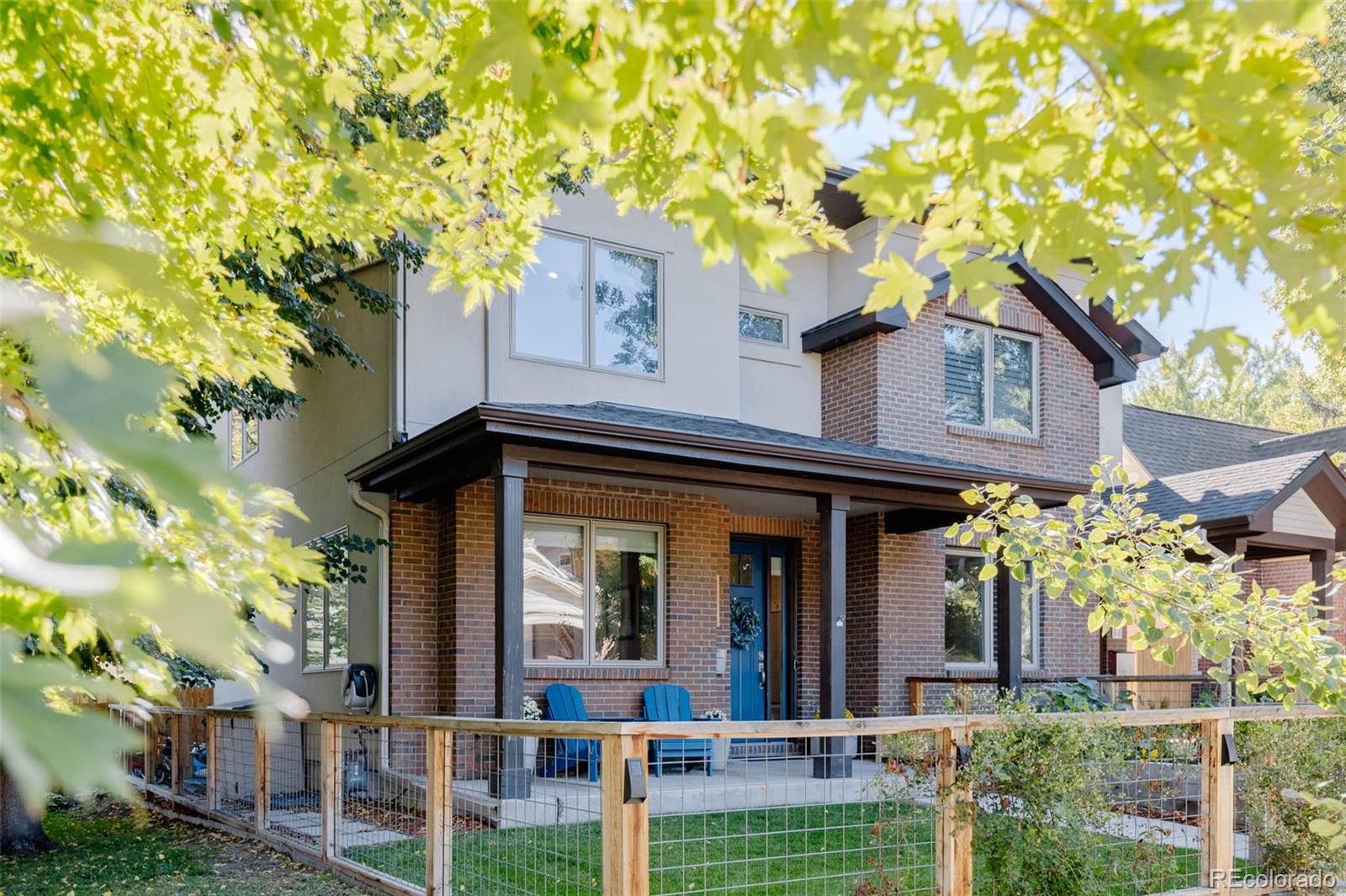 3738 Raleigh Street Denver, CO 80212 - Photo 2 of 34 front view of a house with a tree