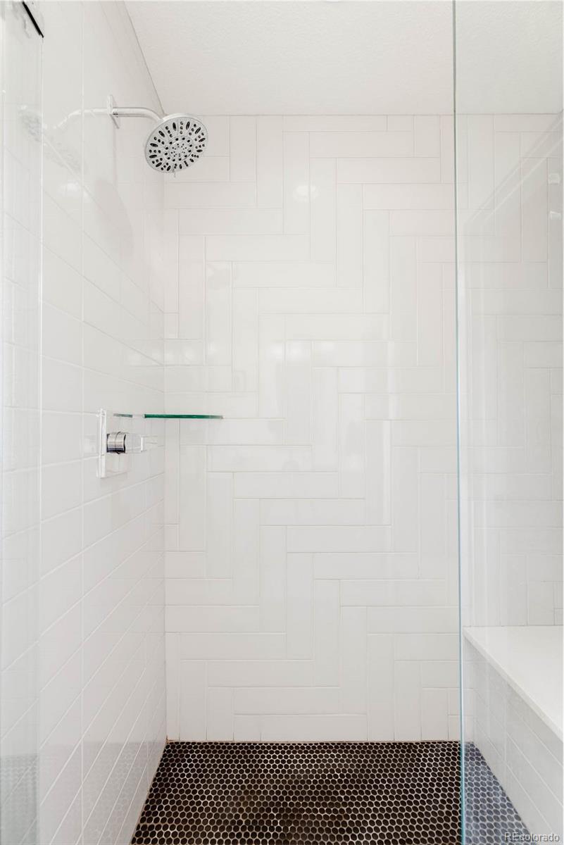 3738 Raleigh Street Denver, CO 80212 - Photo 23 of 34 a bathroom with a shower