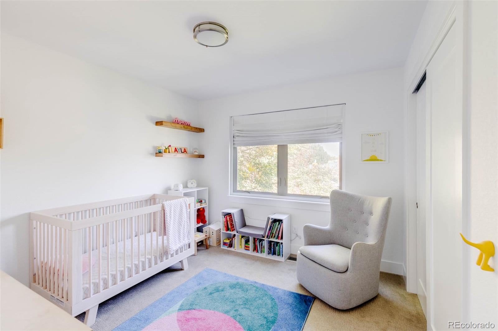 3738 Raleigh Street Denver, CO 80212 - Photo 24 of 34 a bedroom with furniture and a window