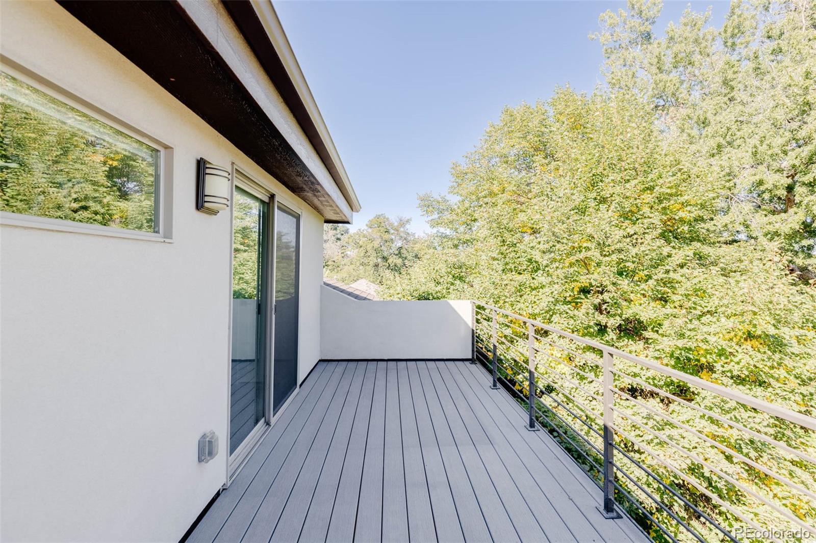 3738 Raleigh Street Denver, CO 80212 - Photo 30 of 34 a view of balcony with wooden floor