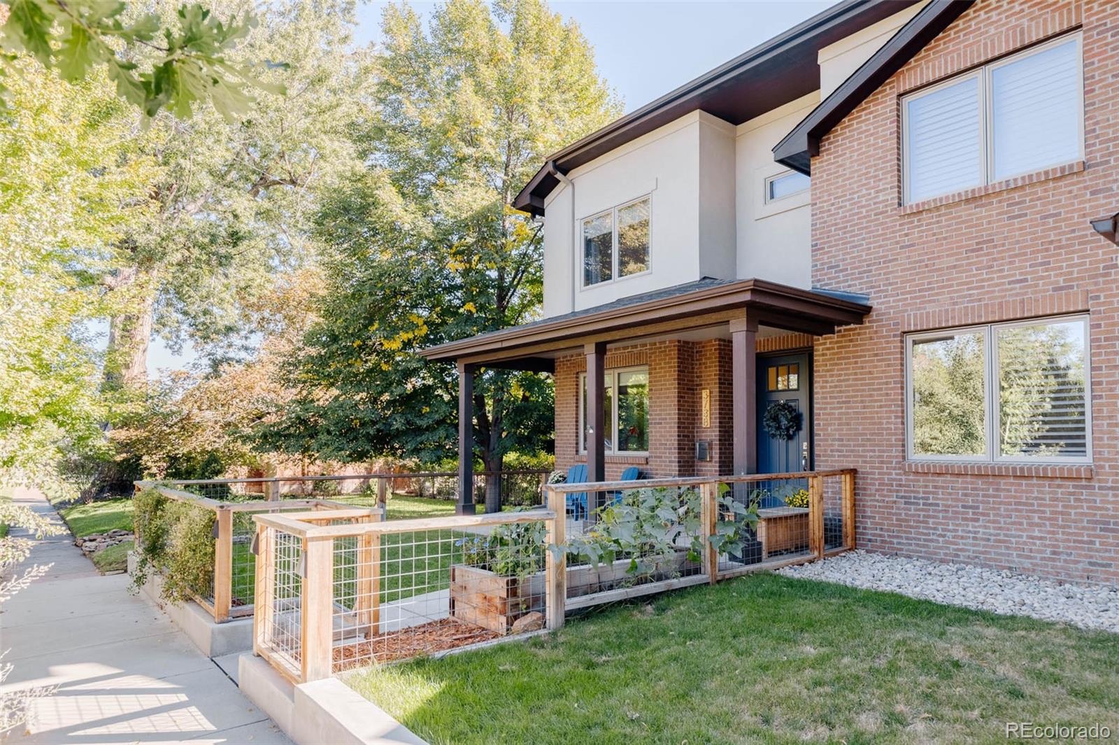 3738 Raleigh Street Denver, CO 80212 - Photo 3 of 34 a view of a house with backyard porch and sitting area