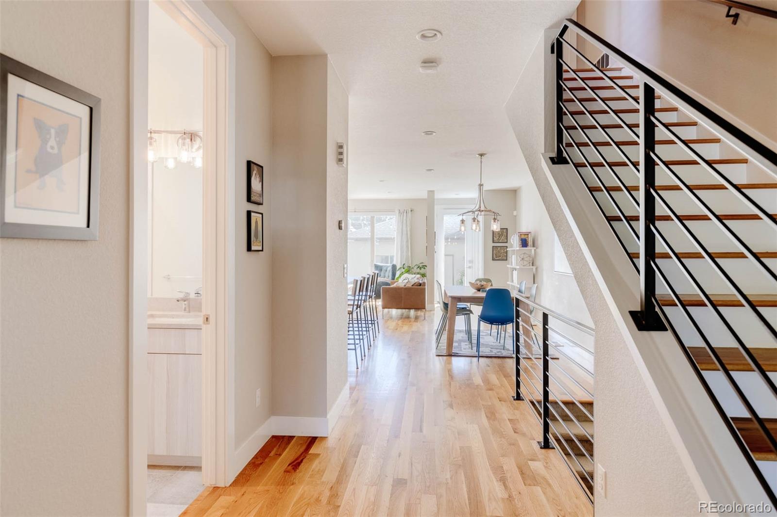 3738 Raleigh Street Denver, CO 80212 - Photo 8 of 34 a view of entryway and hall with wooden floor