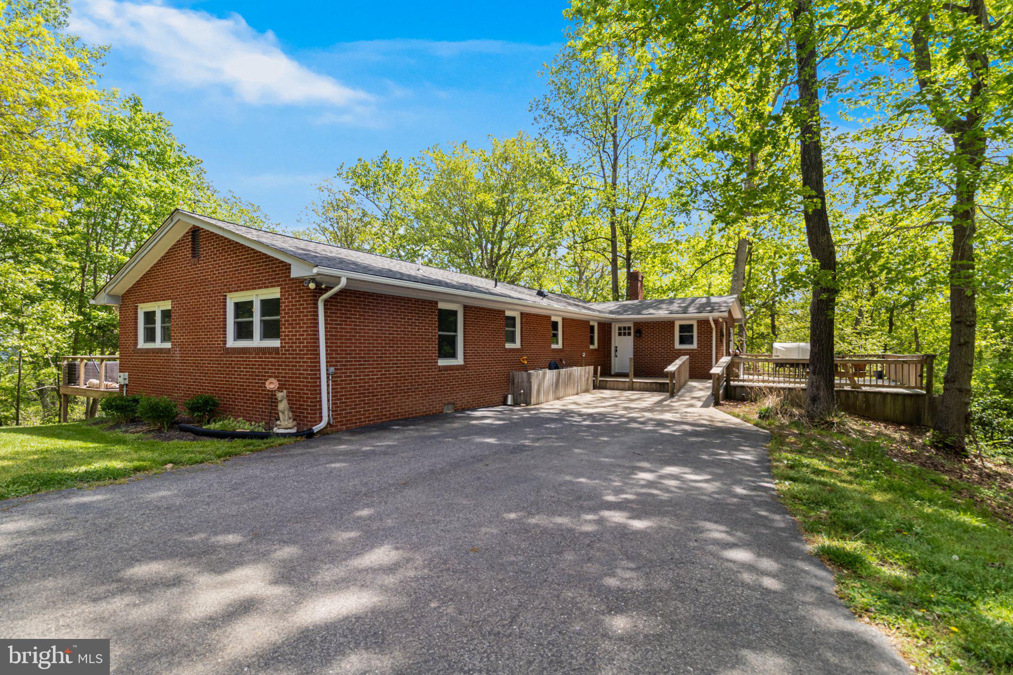 43671 Sunny Ridge Lane Hollywood, MD 20636 - Photo 2 of 45 Charming brick home nestled in nature.