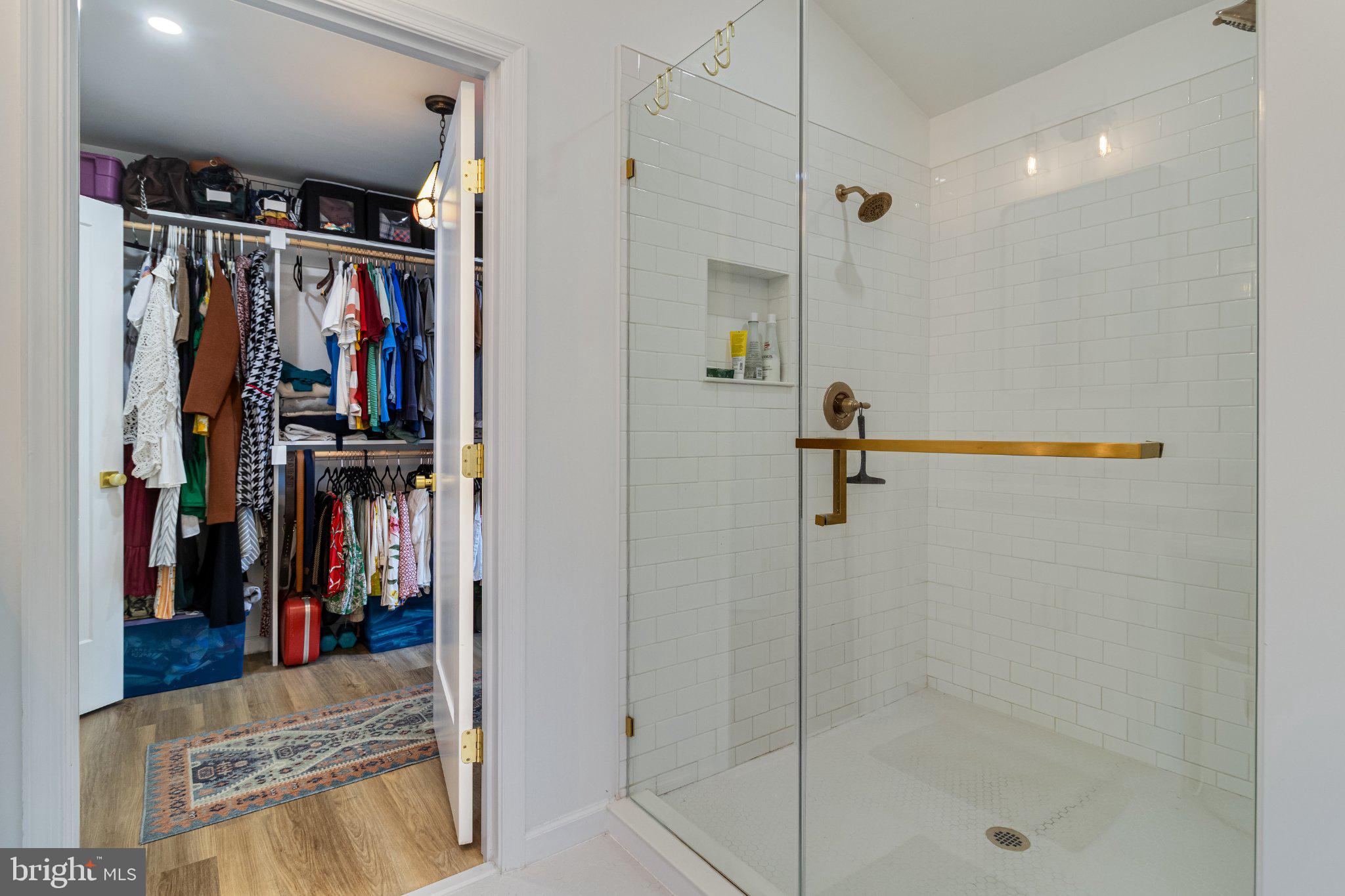 43671 Sunny Ridge Lane Hollywood, MD 20636 - Photo 32 of 45 Sleek shower with stylish closet access.