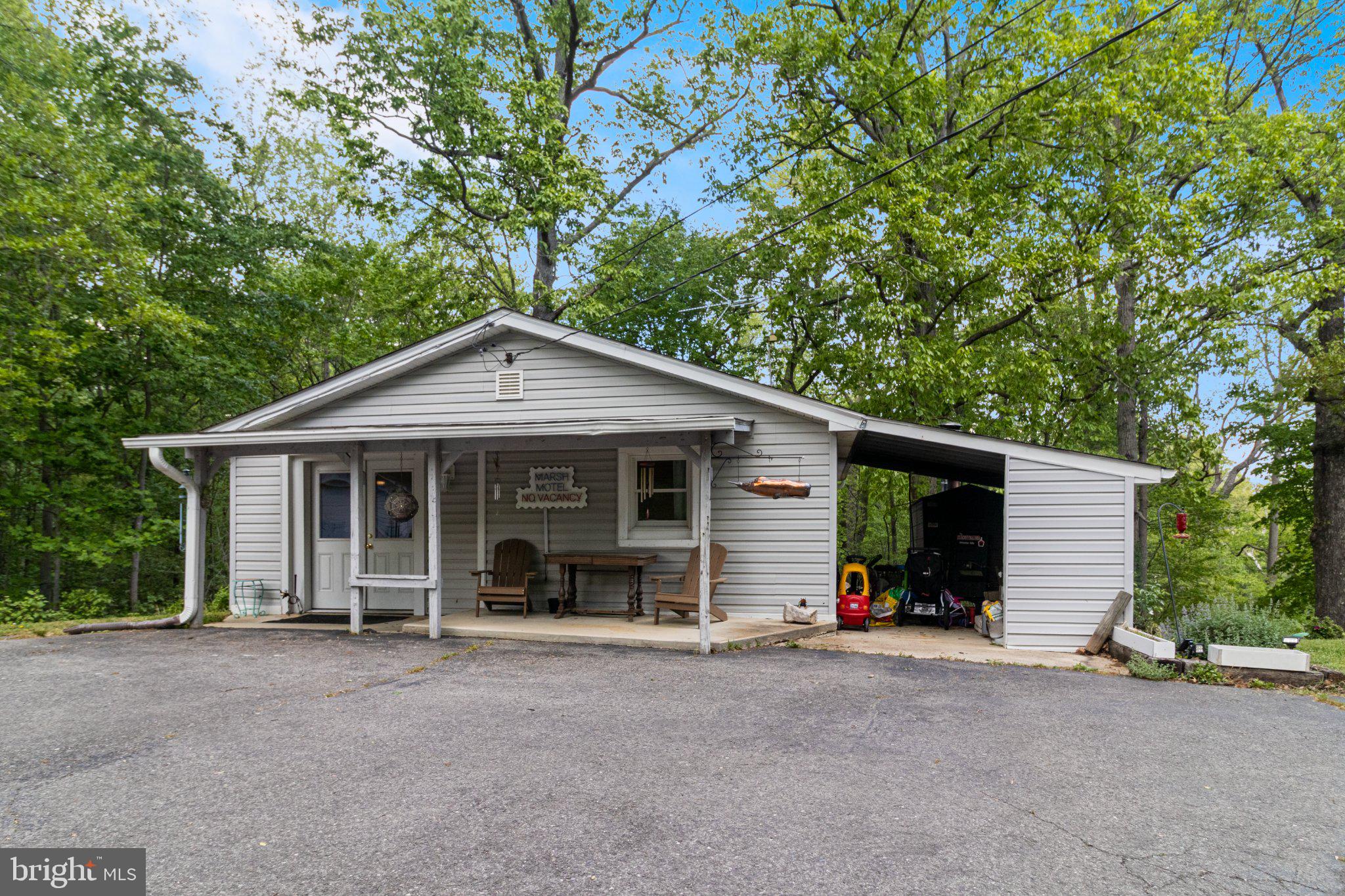 43671 Sunny Ridge Lane Hollywood, MD 20636 - Photo 33 of 45 Charming home nestled in lush greenery.
