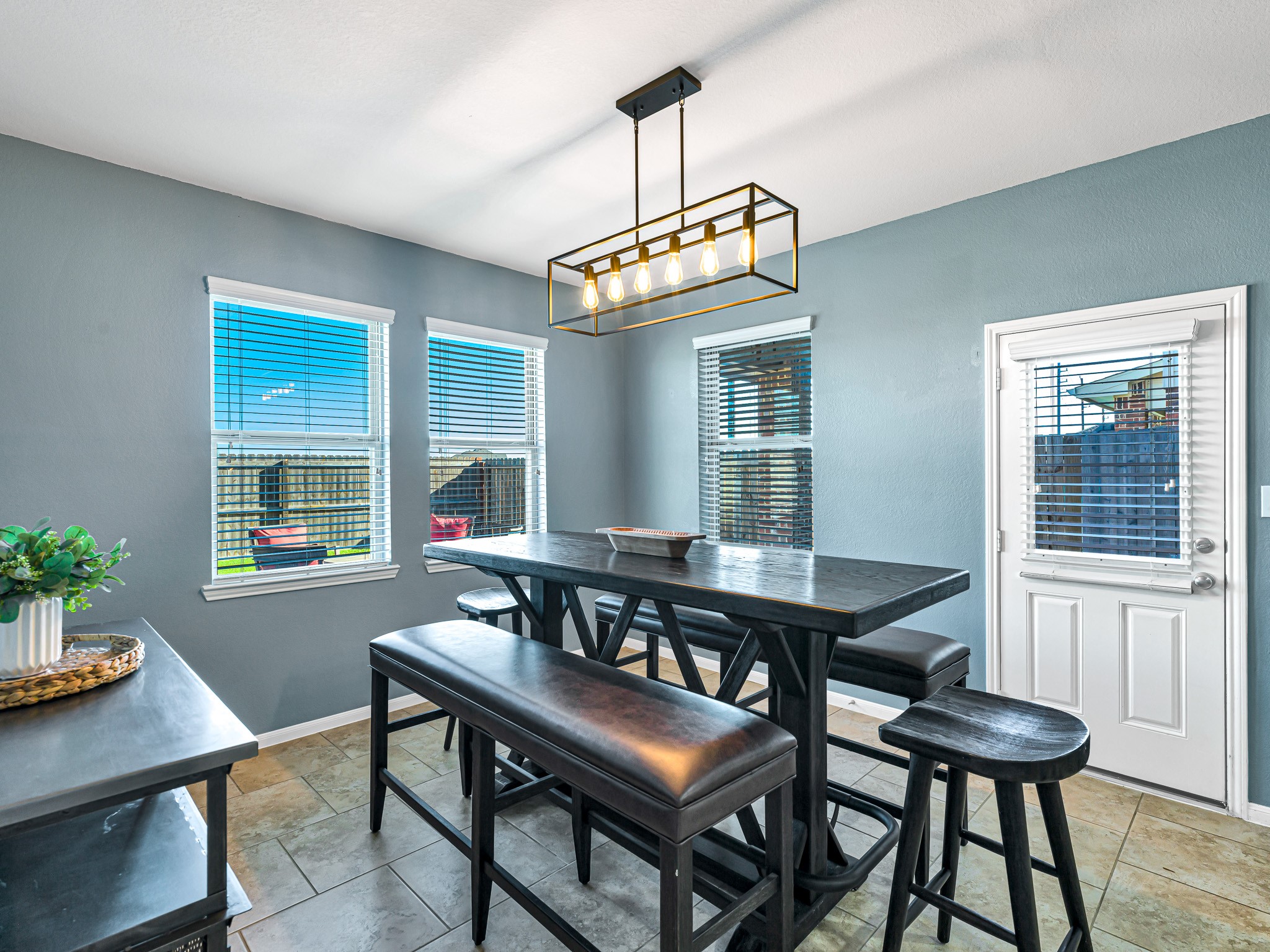 5622 Maxon Court Rosenberg, TX 77471 - Photo 13 of 23 Alternate view of the spacious breakfast room with easy access to the kitchen AND your covered back patio with ceiling fan! Great to catch the morning sunshine or a relaxing evening retreat!