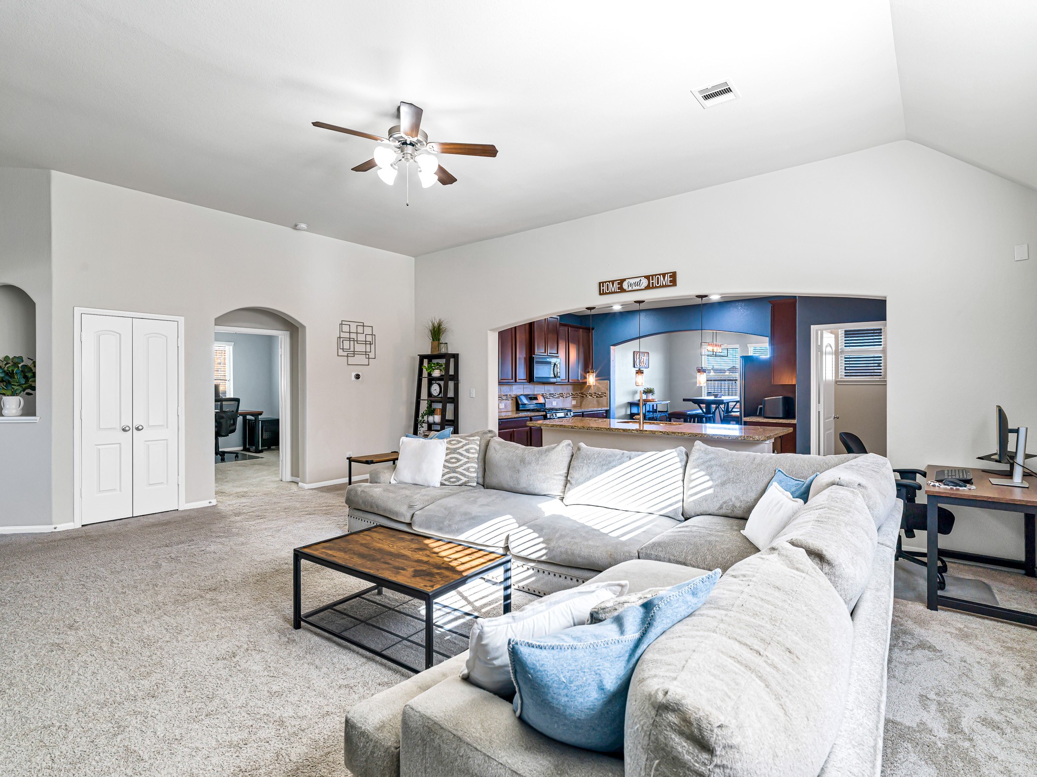 5622 Maxon Court Rosenberg, TX 77471 - Photo 6 of 23 This sprawling living area offers massive floor space for any furniture arrangement! Easy access to your versatile flex space that can easily be your home office / study with french doors for privacy, media room or even a 4th bedroom, since it has it's own closet! Also shown is a dedicated storage closet with double doors!