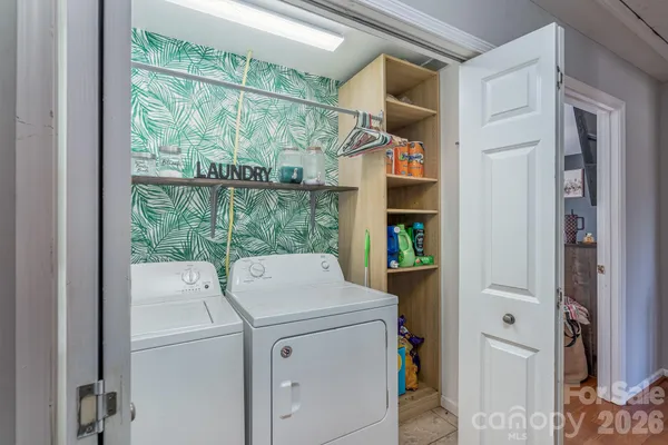 a utility room with dryer and washer