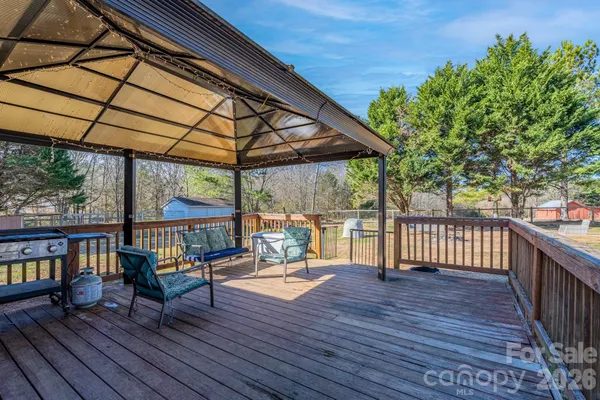 a view of chairs with wooden deck