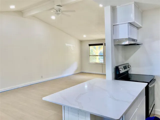 an entryway with table and window