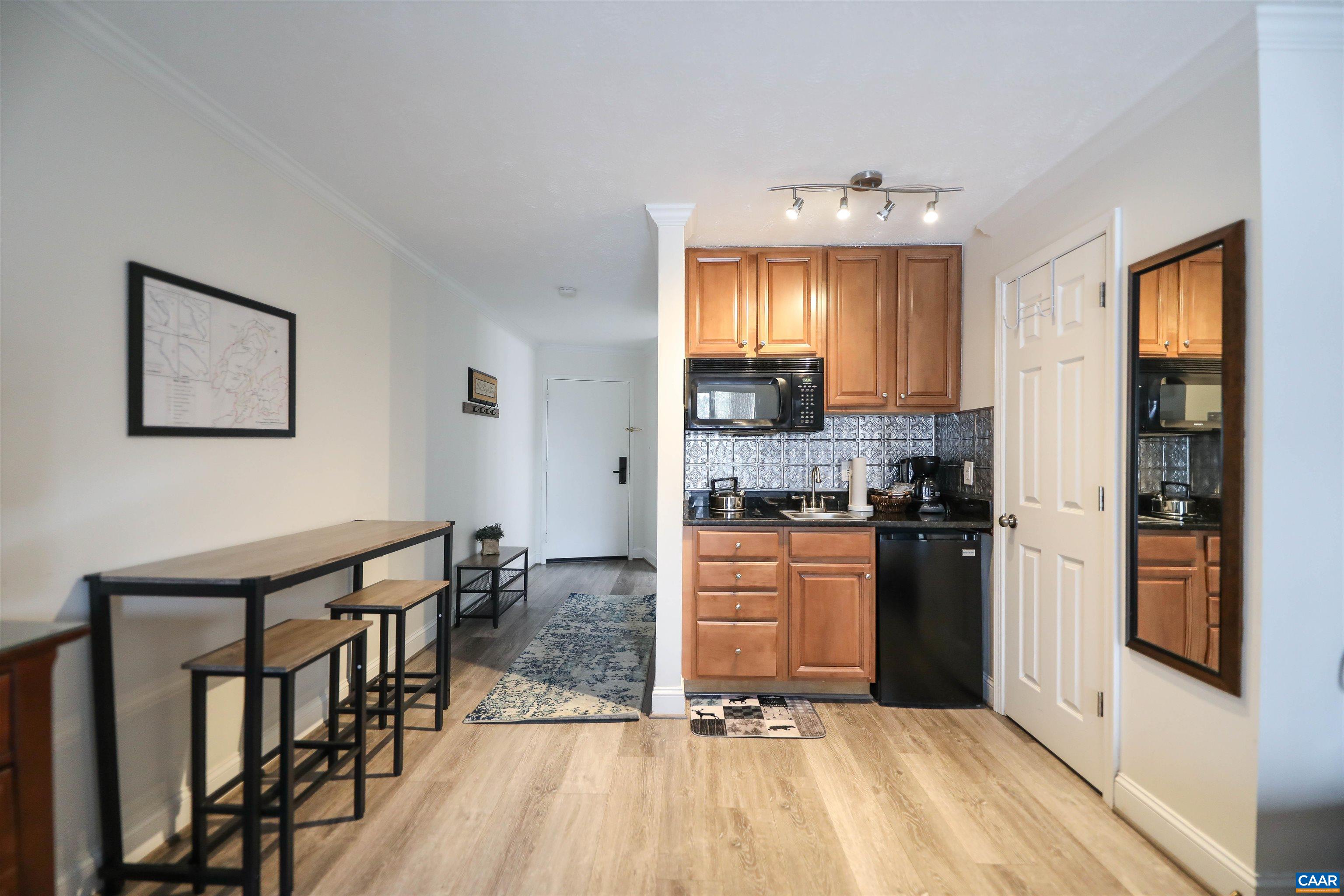 208 Timbers Roseland, VA 22967 - Photo 12 of 25 a kitchen with granite countertop a refrigerator stove top oven and sink