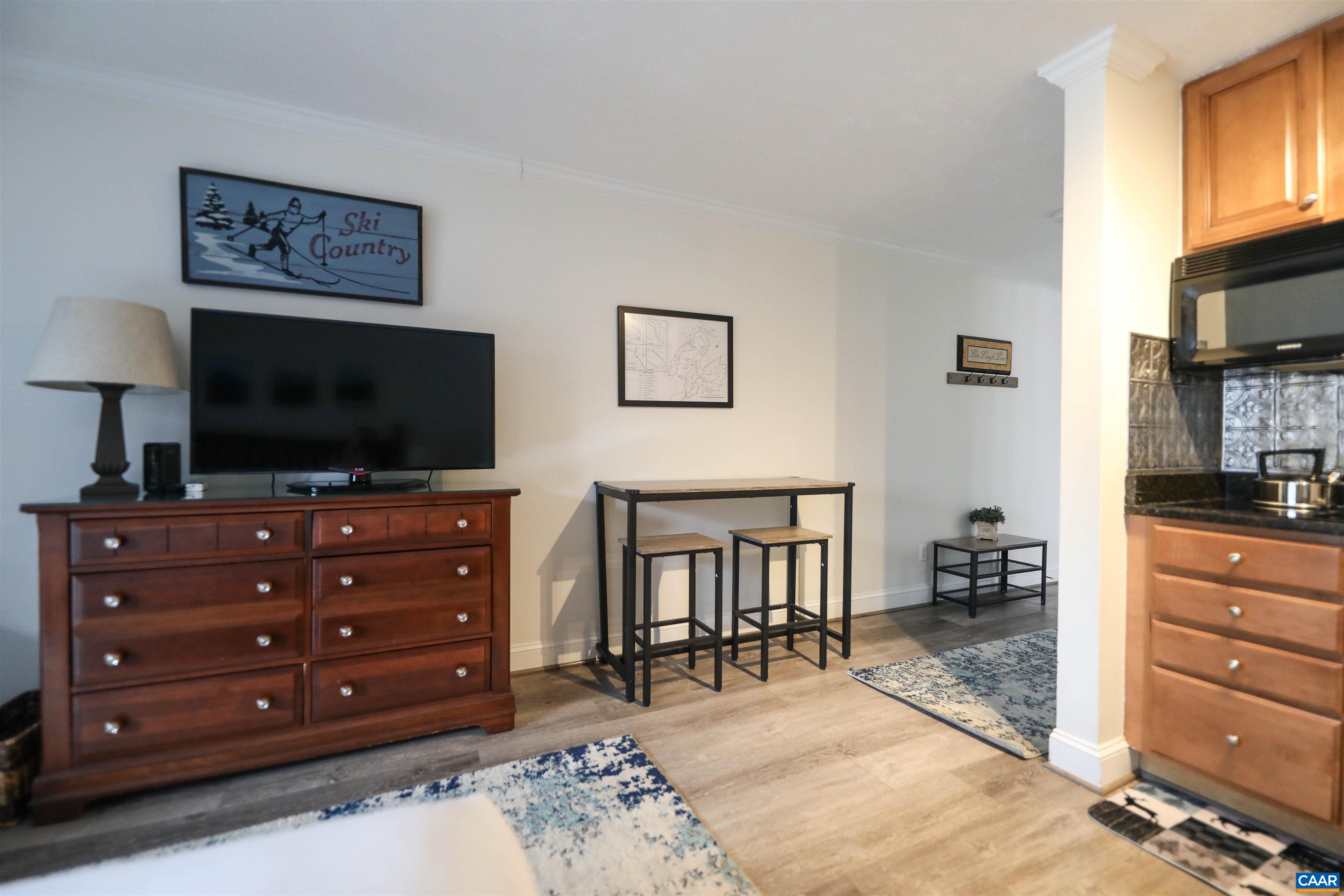 208 Timbers Roseland, VA 22967 - Photo 15 of 25 a living room with furniture and a flat screen tv
