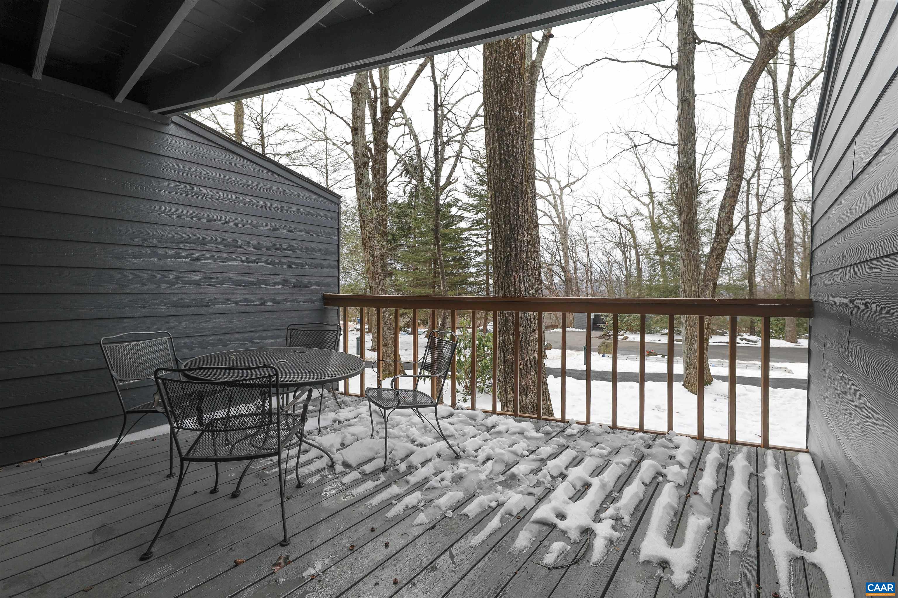 208 Timbers Roseland, VA 22967 - Photo 16 of 25 a view of a chairs and table on the wooden deck