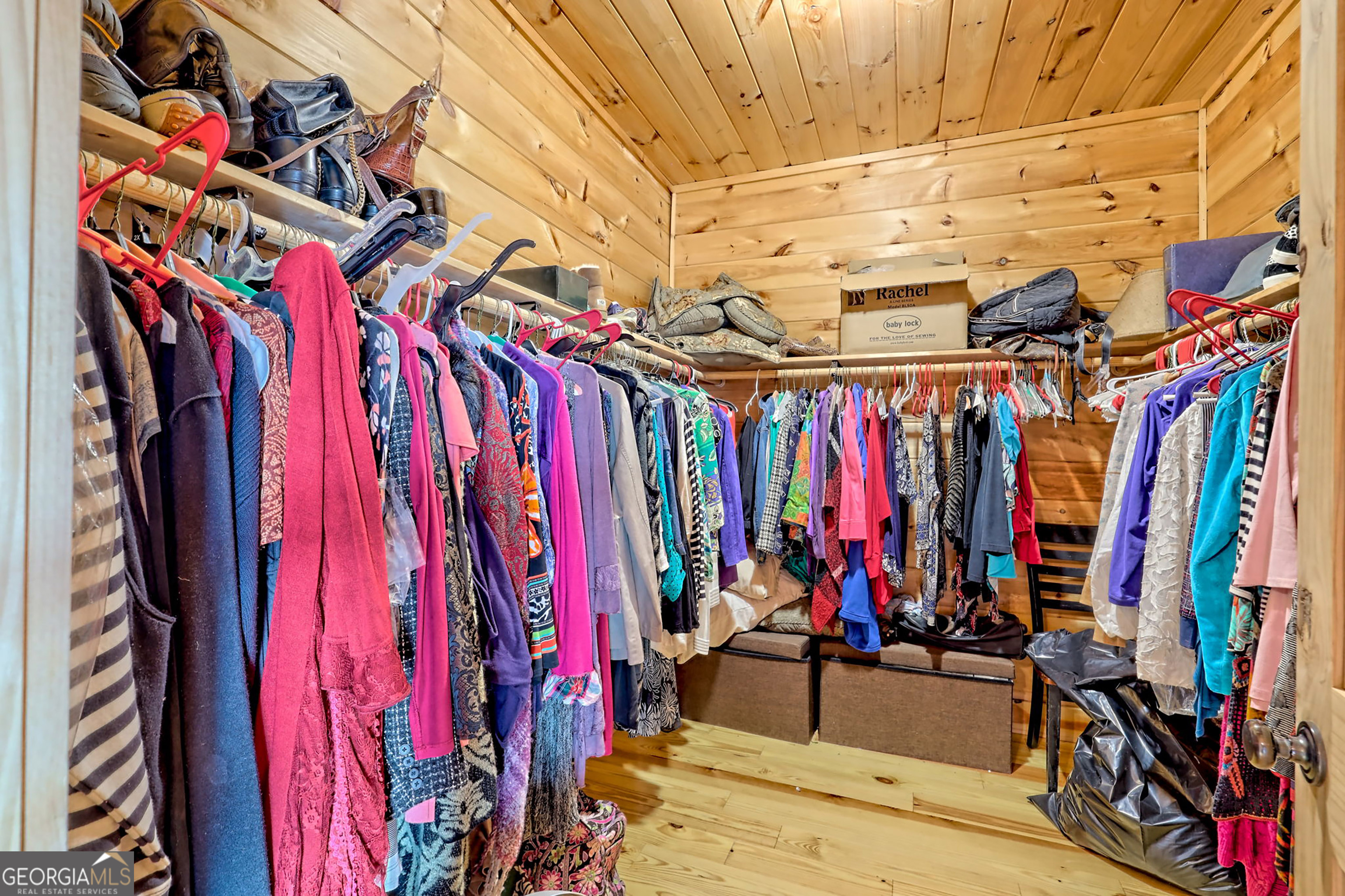 407 Blackberry Drive Rabun Gap, GA 30568 - Photo 25 of 53 a view of walk in closet with clothes