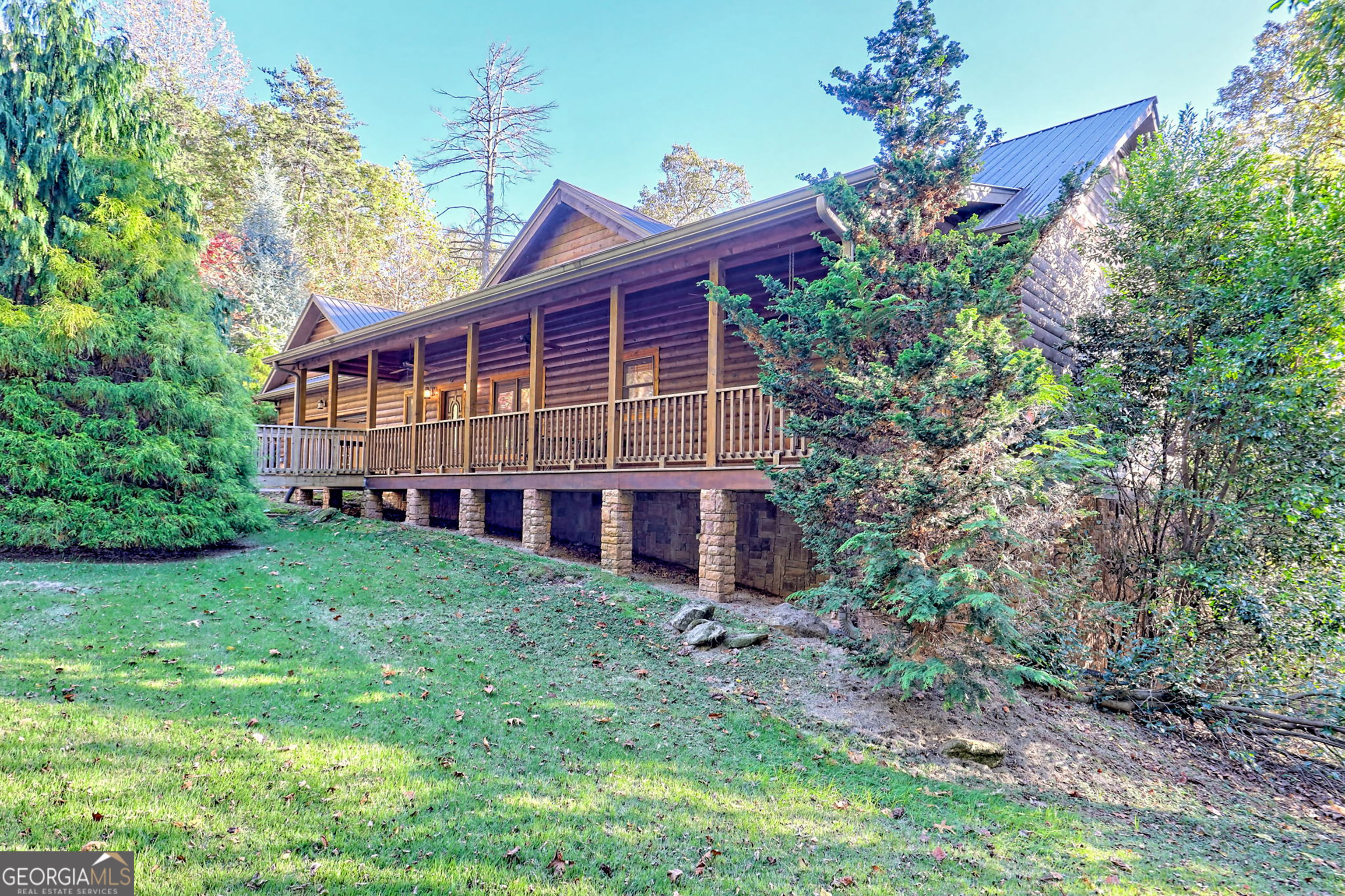 407 Blackberry Drive Rabun Gap, GA 30568 - Photo 3 of 53 a view of front of a house with a yard