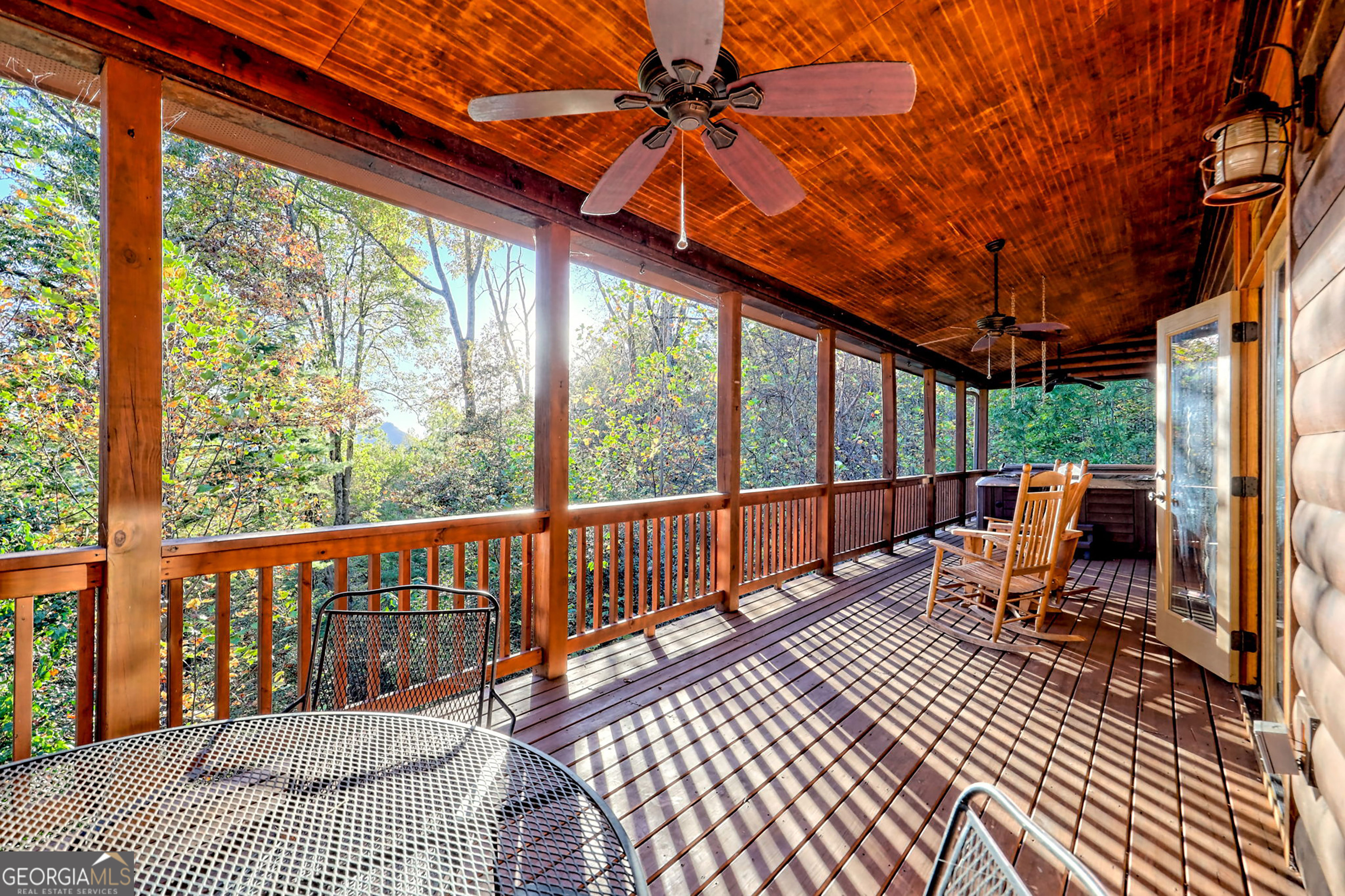 407 Blackberry Drive Rabun Gap, GA 30568 - Photo 35 of 53 a balcony view with a seating space