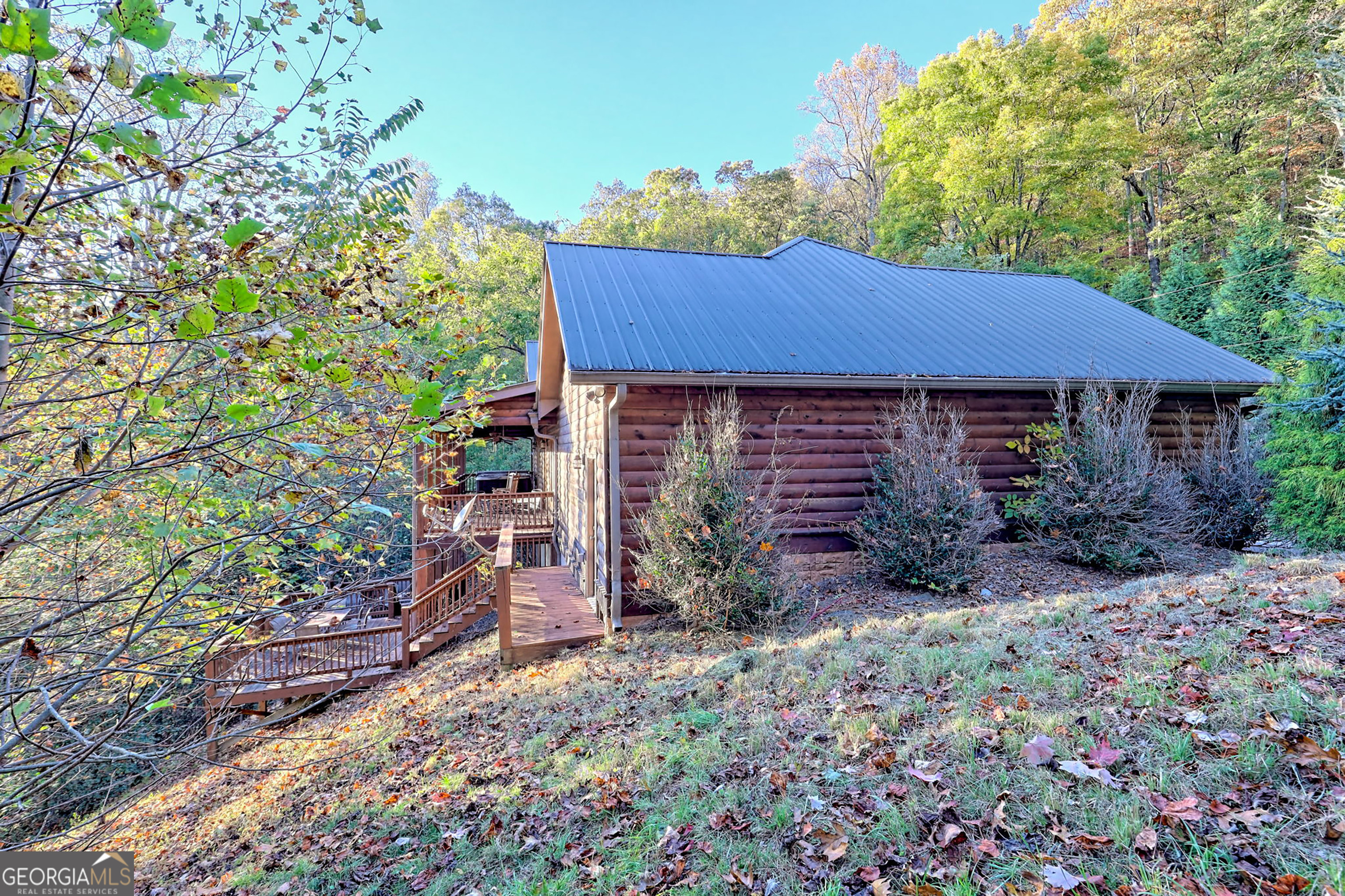 407 Blackberry Drive Rabun Gap, GA 30568 - Photo 51 of 53 a view of a house with a garden