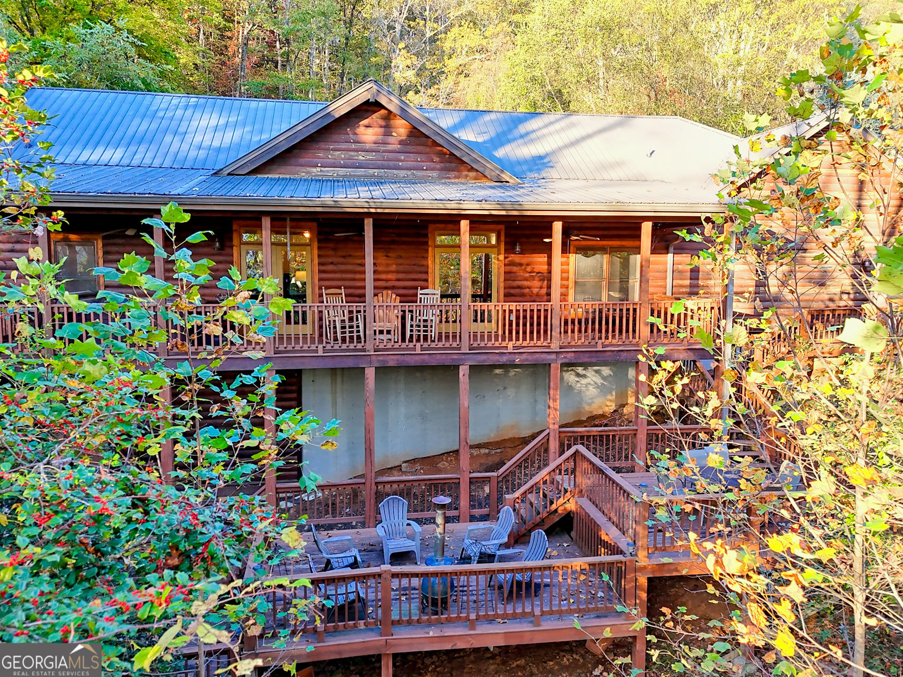 407 Blackberry Drive Rabun Gap, GA 30568 - Photo 52 of 53 a front view of a house with garden