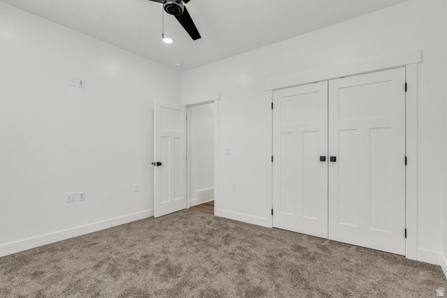 520 East 450th Street North Delta, UT 84624 - Photo 35 of 48 Unfurnished bedroom featuring carpet flooring, a closet, and ceiling fan