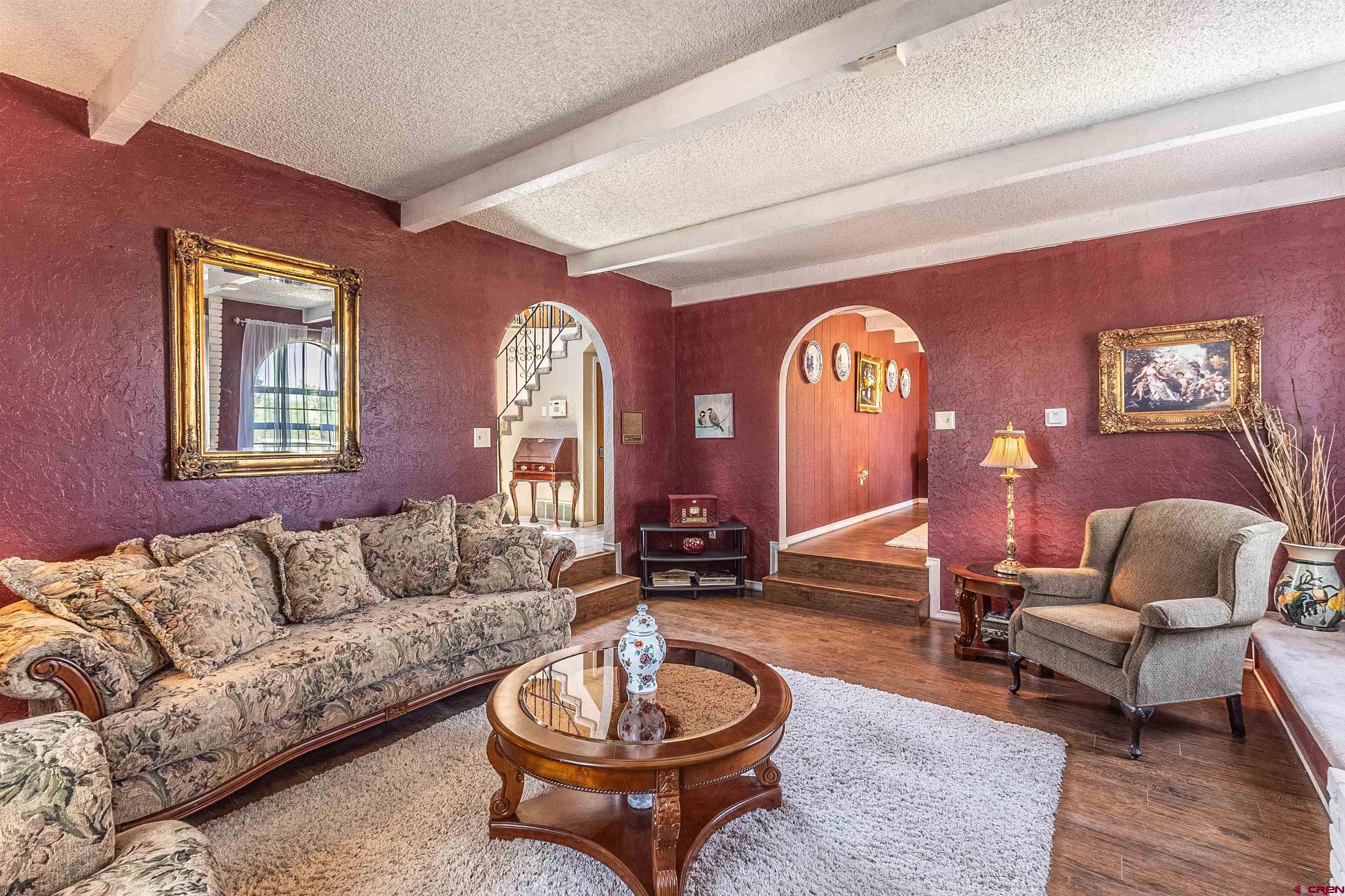 5510 Rinconada Street Farmington, NM 87402 - Photo 13 of 45 a living room with furniture a rug and a window