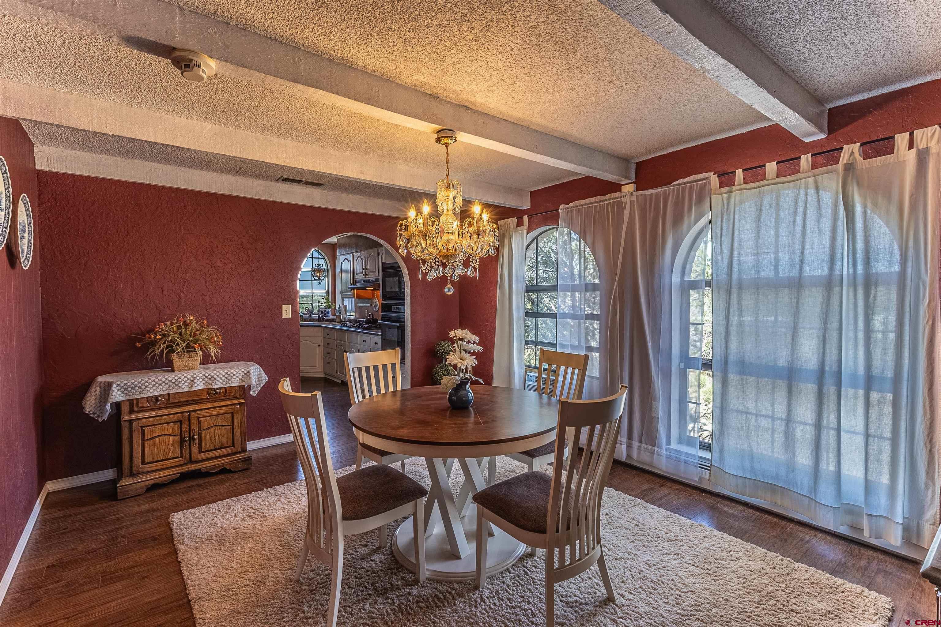 5510 Rinconada Street Farmington, NM 87402 - Photo 15 of 45 a dining room with furniture and window
