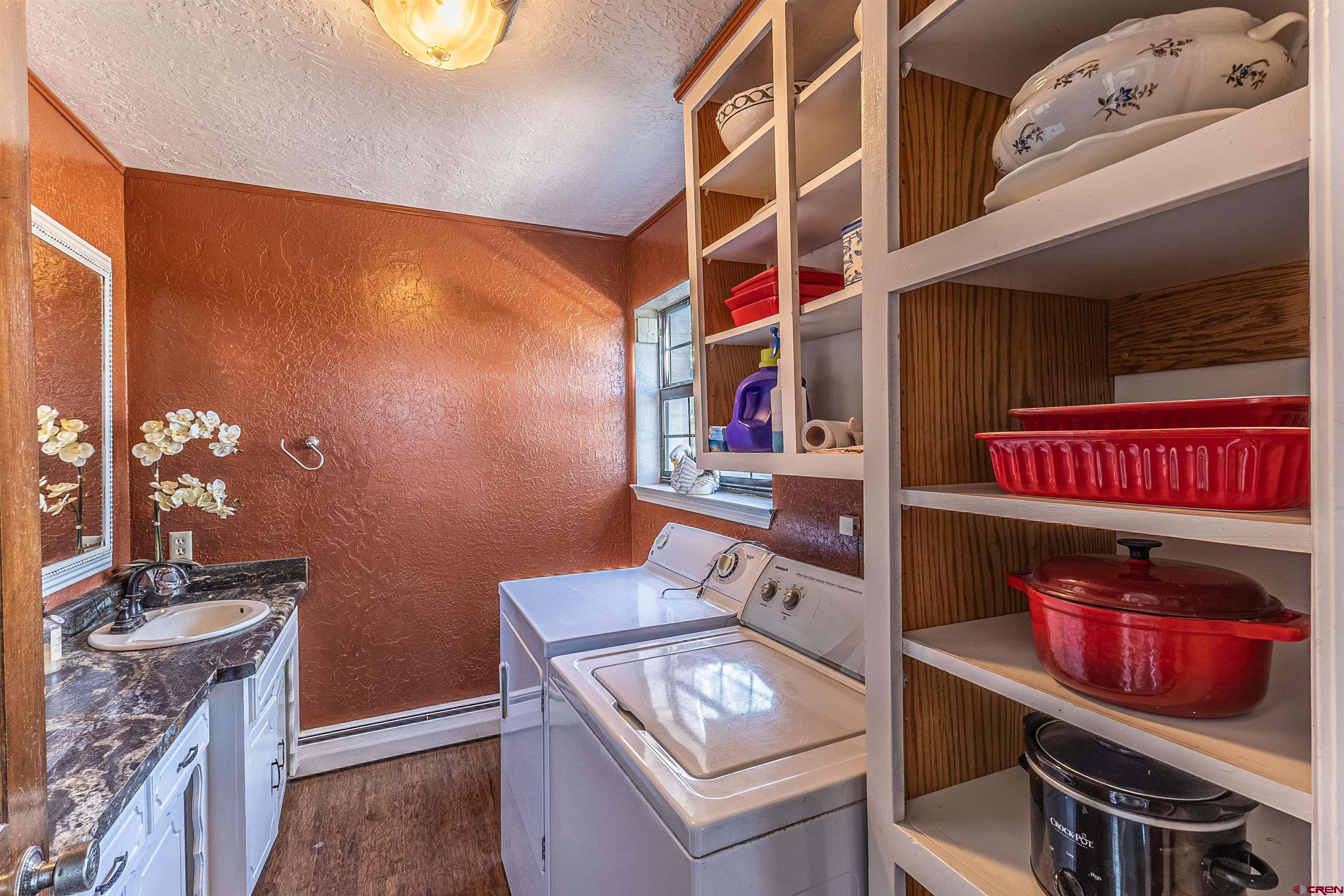 5510 Rinconada Street Farmington, NM 87402 - Photo 21 of 45 a utility room with dryer and washer