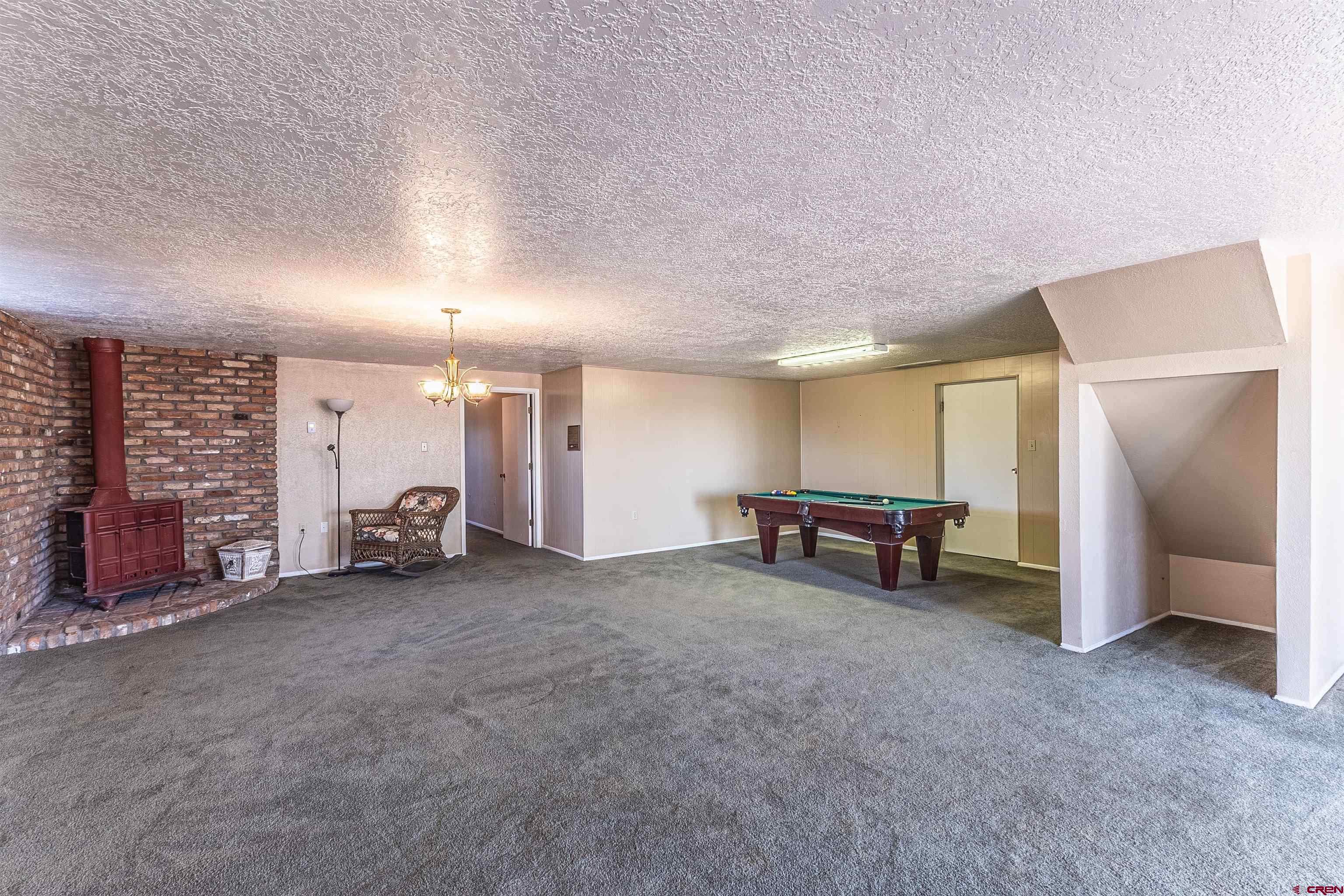 5510 Rinconada Street Farmington, NM 87402 - Photo 28 of 45 an empty room with furniture and a window