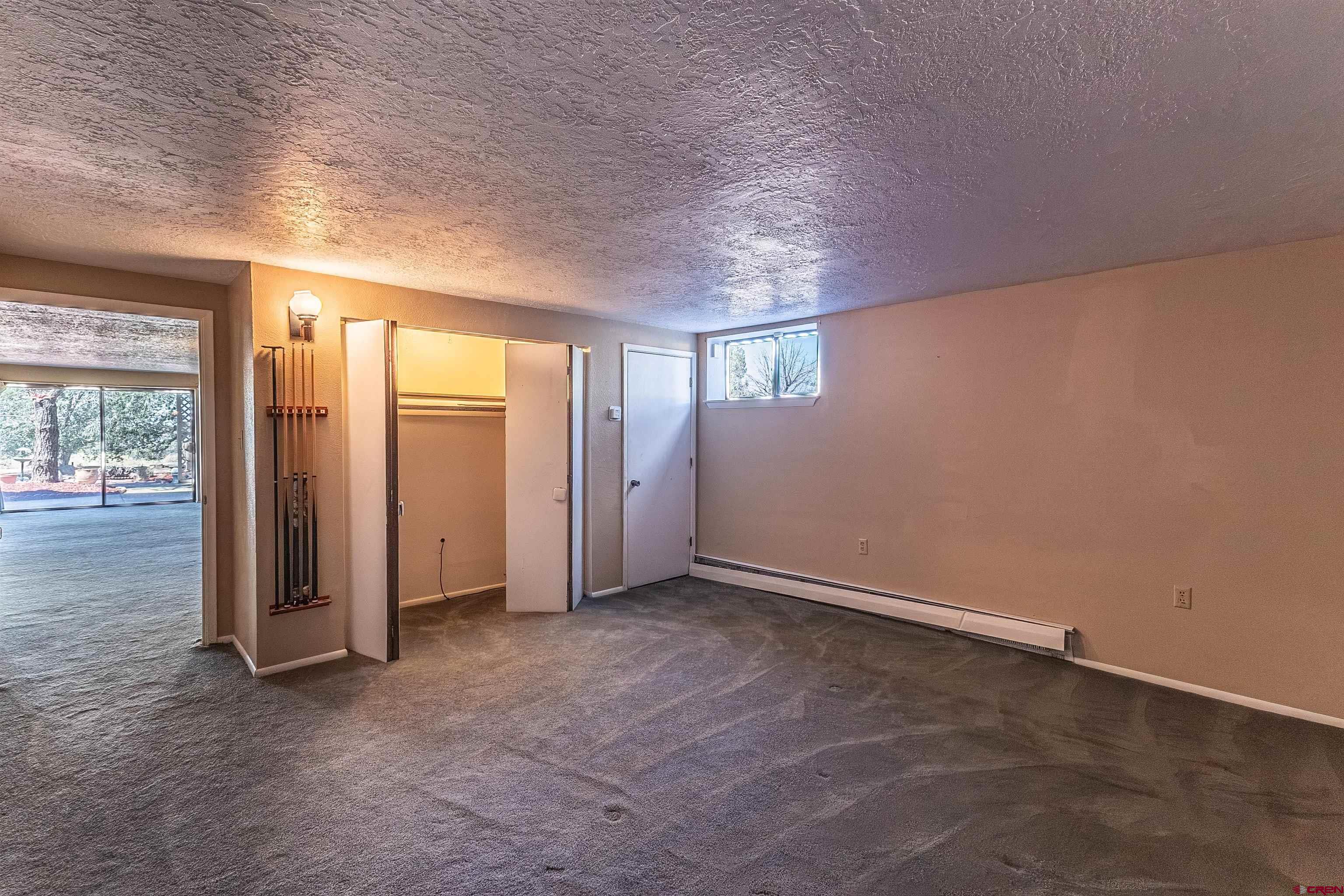 5510 Rinconada Street Farmington, NM 87402 - Photo 30 of 45 an empty room with windows