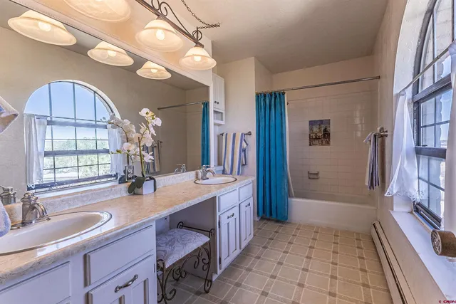 a front view of a house with large windows