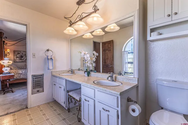 a view of living room kitchen and entryway
