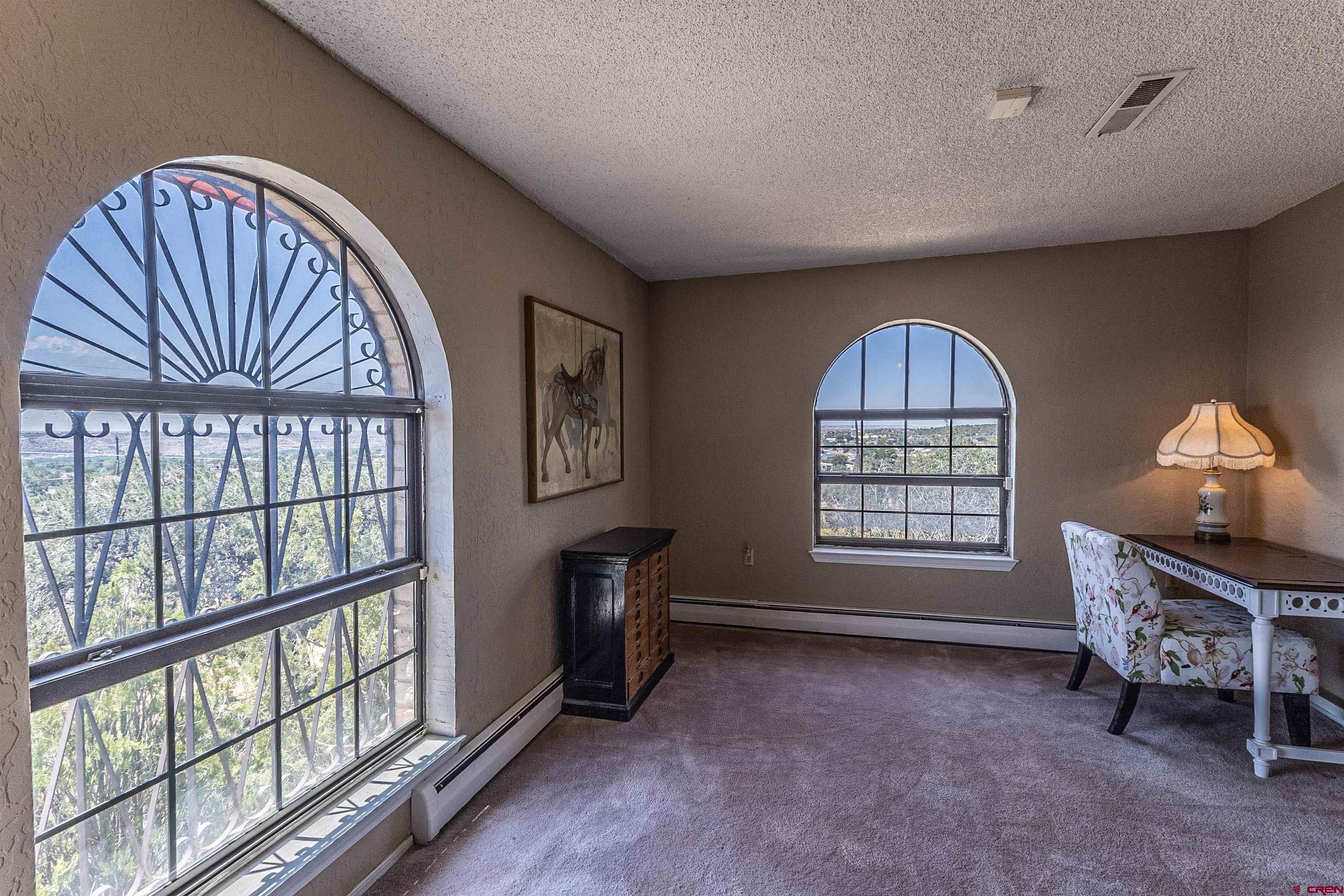 5510 Rinconada Street Farmington, NM 87402 - Photo 43 of 45 a view of livingroom with furniture and windows