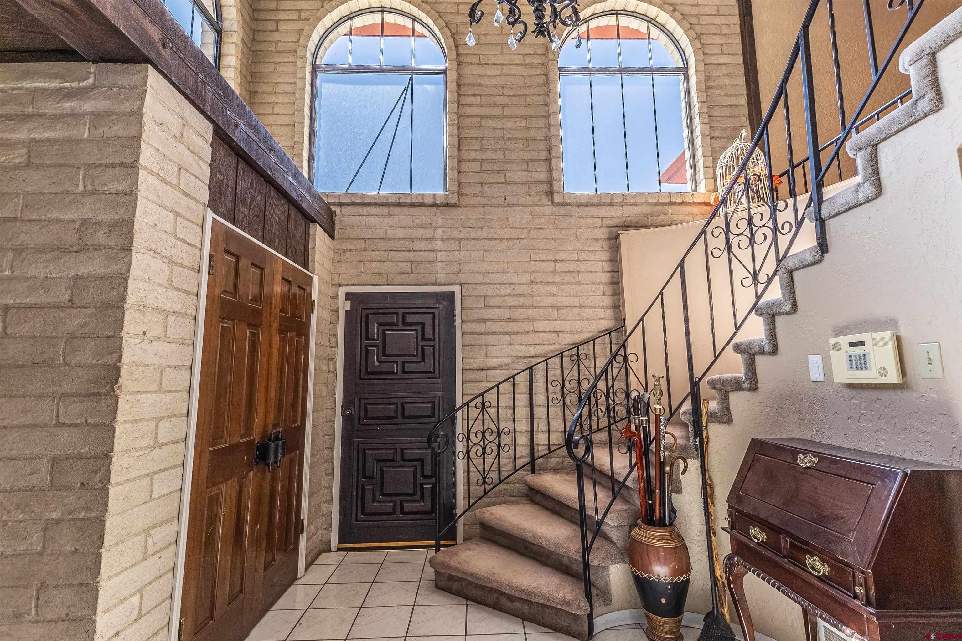 5510 Rinconada Street Farmington, NM 87402 - Photo 9 of 45 a view of entryway with wooden floor