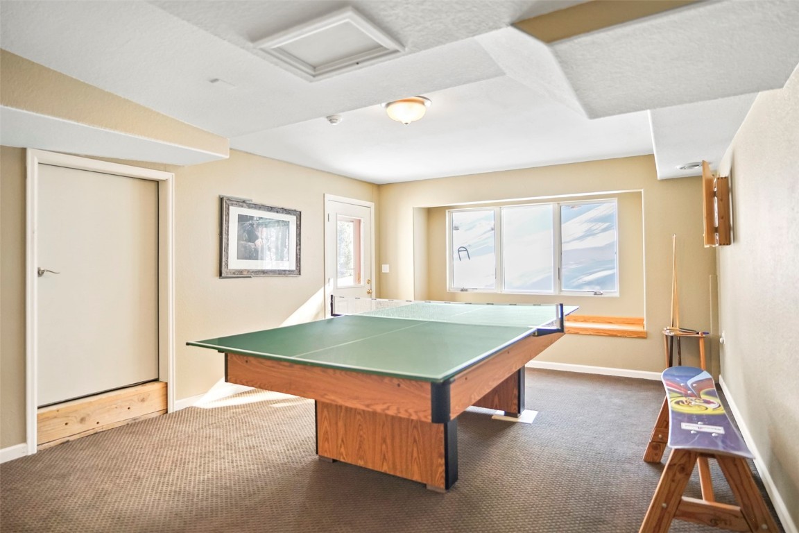 468 South Hillside Drive Silverthorne, CO 80498 - Photo 30 of 34 a room with pool table and windows