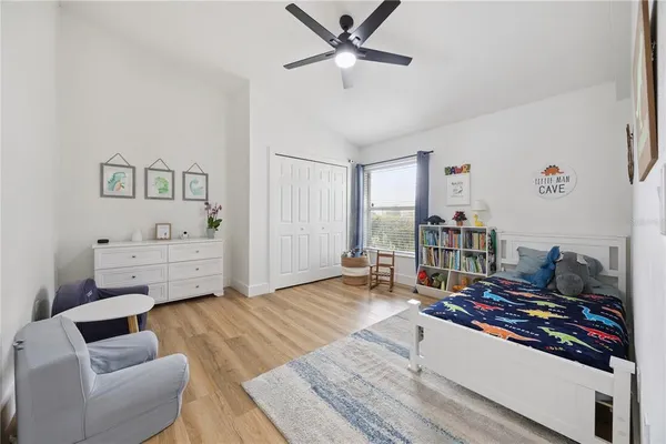 a view of a livingroom with furniture and a potted plant