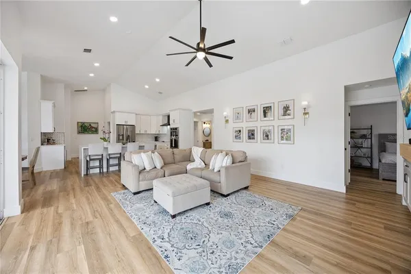 a living room with furniture and a table