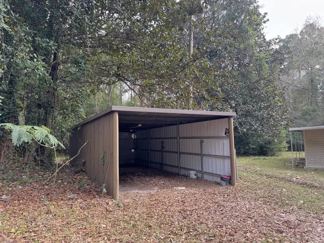 a house with trees in the background