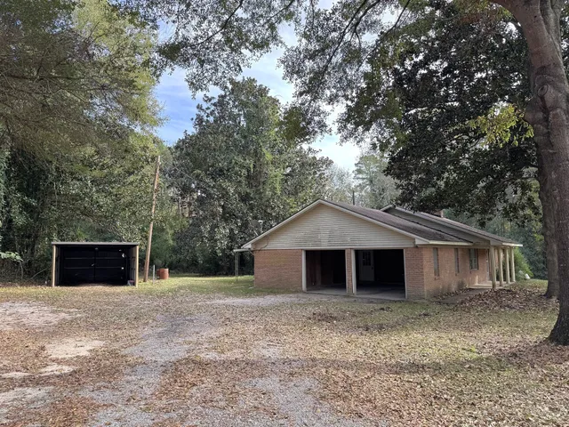 a barn house with a outdoor space
