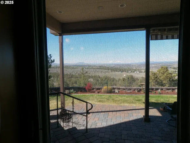 a view of swimming pool from a balcony
