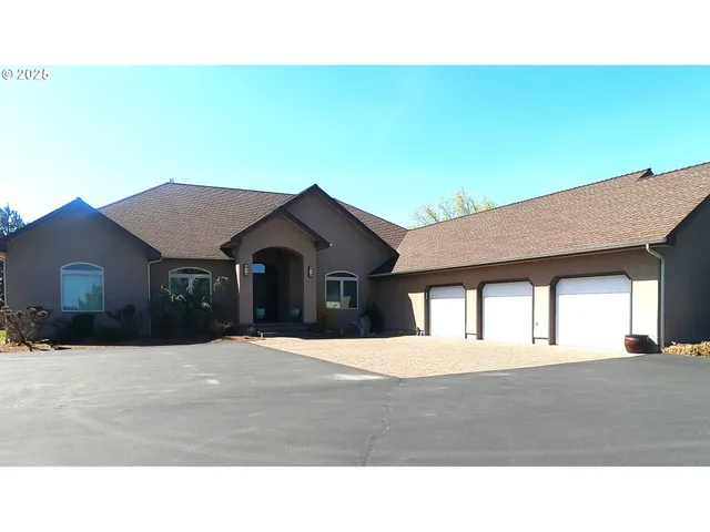 a black and white photo of a house