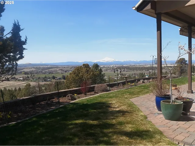 a view of a balcony with lake view and mountain view