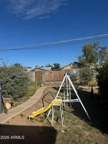 a view of a golf course with a fountain