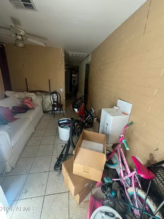 a living room with furniture and a table