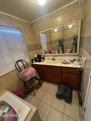 a kitchen with a stove and a refrigerator