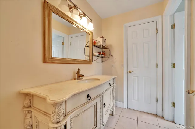a bathroom with a bathtub and a sink