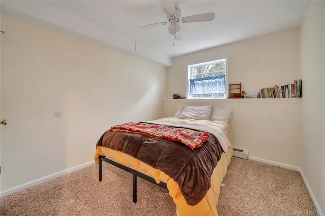 a view of a lobby with furniture and a chandelier