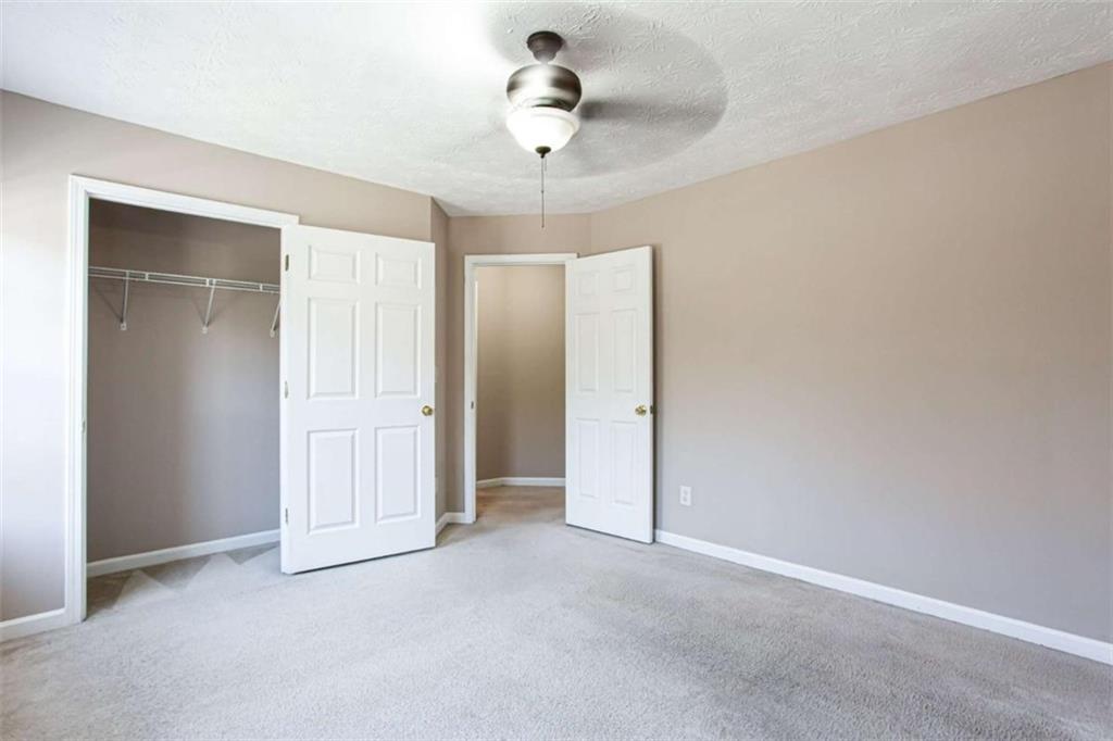3721 Bogan Mill Road Northeast Buford, GA 30519 - Photo 30 of 58 a view of empty room with ceiling fan